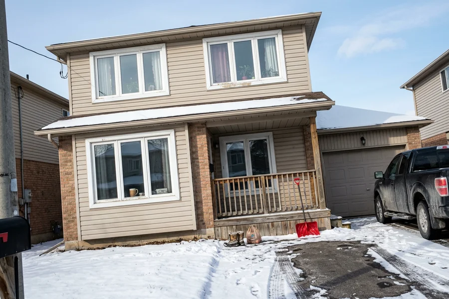 Finished vinyl casement windows across the front of a two-storey Toronto home